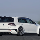 A Volkswagen Golf R in a very white, pure, and race-ready configuration.